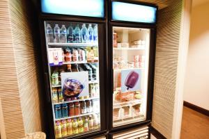 a refrigerator filled with lots of drinks at Hampton Inn & Suites Ocala - Belleview in Marion Oaks