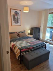 Voodi või voodid majutusasutuse Luxury Apartment New Street Birmingham Feel At Home toas