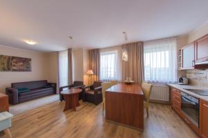 Kuchyňa alebo kuchynka v ubytovaní Apartamenty Diva Kołobrzeg