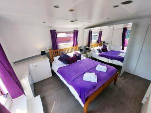 an overhead view of a bedroom with two beds at The Joker Boat in Liverpool