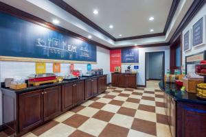 a fast food restaurant with a checkered floor at Hampton Inn London-North, Ky in London