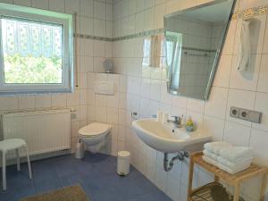 Koupelna v ubytování Ferienwohnung Taubertal Familie Arold + 13 fotografií