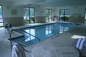 a large swimming pool in a building at Hampton Inn Stroudsburg Poconos in Stroudsburg