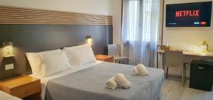 Postel nebo postele na pokoji v ubytování Bed & Bike Feltre