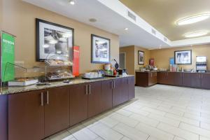 a lobby of a hotel with a buffet line at Hampton Inn Biloxi-Ocean Springs in Biloxi