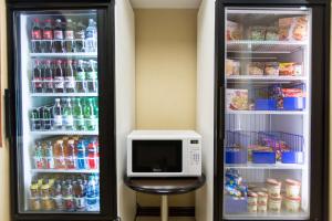 a refrigerator filled with lots of drinks and a microwave at Hampton Inn and Suites Parsippany/North in Parsippany