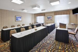 a conference room with rows of tables and chairs at Hampton Inn Pittsburgh Area-Beaver Valley-Center Township in Monaca