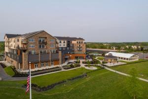 an aerial view of a building with a green lawn at Hotel Canandaigua, Tapestry Collection By Hilton in Canandaigua