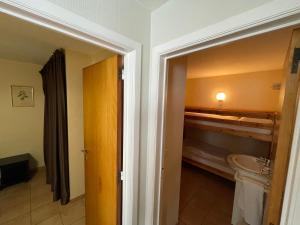 Postel nebo postele na pokoji v ubytování Hotel Du Soleil