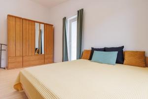 מיטה או מיטות בחדר ב-Villa Rona