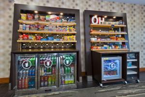 two soda machines in a store with drinks at Hampton Inn Marysville in Marysville