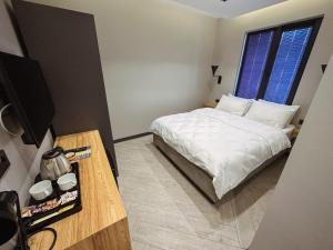 Ένα ή περισσότερα κρεβάτια σε δωμάτιο στο Hostel Amasra