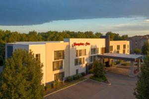 an aerial view of a building with a hotel at Hampton Inn Columbia in Columbia