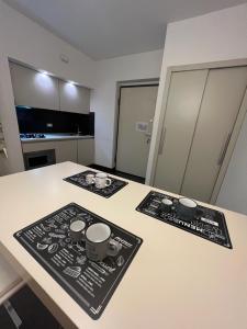 Virtuve vai virtuves zona naktsmītnē Qatar Apartment