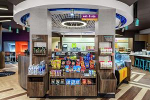 a store filled with lots of food and drinks at Tru By Hilton Crossett in Crossett