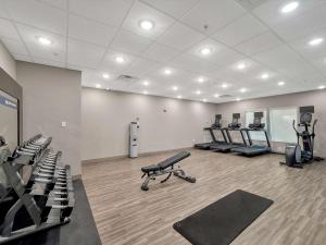 a gym with rows of treadmills and exercise bikes at Hampton Inn and Suites Lufkin in Lufkin