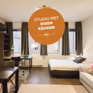 Postel nebo postele na pokoji v ubytování Getaway Studios Leuven