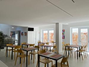 TV a/nebo společenská místnost v ubytování Hotel Arte Mare
