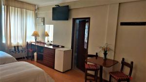 A bed or beds in a room at Lima Wasi Hotel Miraflores