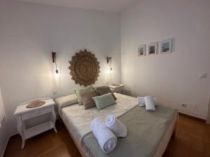 Tempat tidur dalam kamar di Sa Caseta d'Artrutx