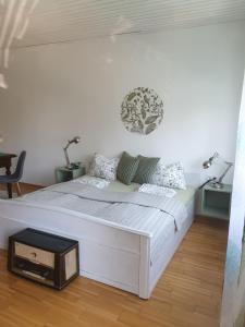 Posteľ alebo postele v izbe v ubytovaní Ferienwohnung mit Pool an der Apfelstraße + 37 fotografií