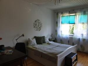 Posteľ alebo postele v izbe v ubytovaní Ferienwohnung mit Pool an der Apfelstraße