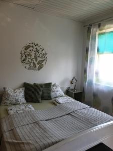 Posteľ alebo postele v izbe v ubytovaní Ferienwohnung mit Pool an der Apfelstraße