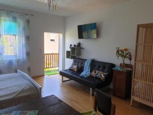 Posedenie v ubytovaní Ferienwohnung mit Pool an der Apfelstraße