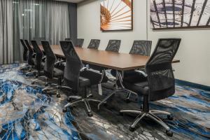 a conference room with a table and chairs on a carpet at Fairfield Inn Richmond Chester in Chester