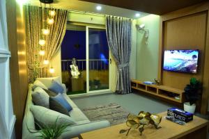 TV a/nebo společenská místnost v ubytování Ivory sea castle + 6 fotografií