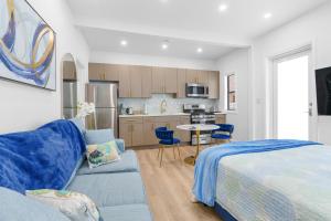 a living room with a bed and a kitchen at 316 Seascape Unit 2 in Hollywood