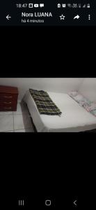a picture of a bed in a room at Hostel Gomes in Sao Paulo