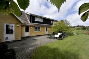 Vrt pred nastanitvijo Lønstrup Strandhotel