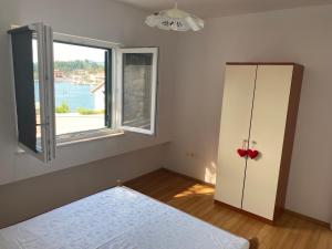 Letto o letti in una camera di 2 bed Comfy Gem: Functional, Ideal Location, Steps to the Beach