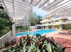 an external view of a swimming pool at a hotel at Condotel Northpoint 2 Bedroom 1 bathroom in Davao City