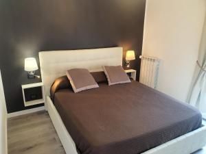 Postel nebo postele na pokoji v ubytování Guest House Brezza Marina