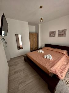 Postel nebo postele na pokoji v ubytování B&B Luchia