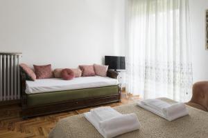Giường trong phòng chung tại Rooms Villa Bergamo Airport +19 ảnh