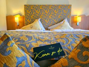 Postel nebo postele na pokoji v ubytování Evident Hotel Prägant 4-Superior