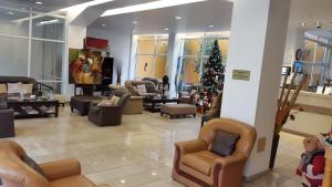 El lobby o recepción de Hotel del Sol
