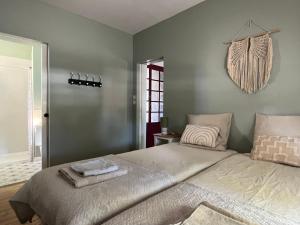 Letto o letti in una camera di Le gîte du port canal