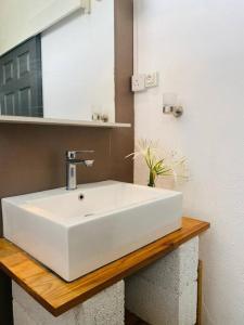 Koupelna v ubytování Modern & Affordable Apartment - Roches Brunes