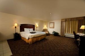 Ένα ή περισσότερα κρεβάτια σε δωμάτιο στο Hampton Inn & Suites Gallup