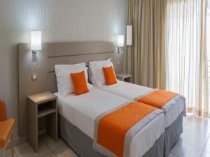 Postel nebo postele na pokoji v ubytování Best Western Plus San Damianu