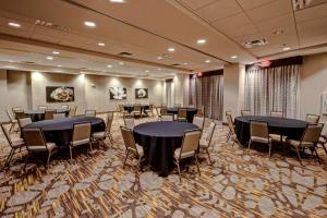 a conference room with tables and chairs in it at Hampton Inn & Suites San Jose Airport in San Jose +19 photos