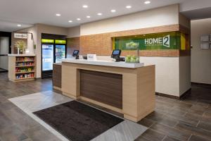 a lobby of a store with a home counter at Home2 Suites By Hilton Valdosta, Ga in Valdosta