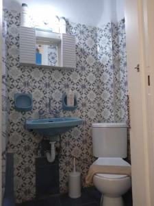 a bathroom with a toilet and a sink at Argiris Old City House 2 in Kalabaka +51 photos