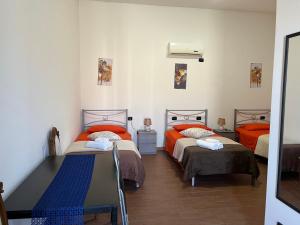 Postel nebo postele na pokoji v ubytování B&B Piandelidei