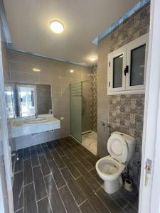 Phòng tắm tại Royal Nile Villas - Nile View Apartment 1