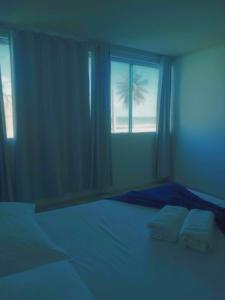 Krevet ili kreveti u jedinici u okviru objekta Pousada Trip Inn Recife